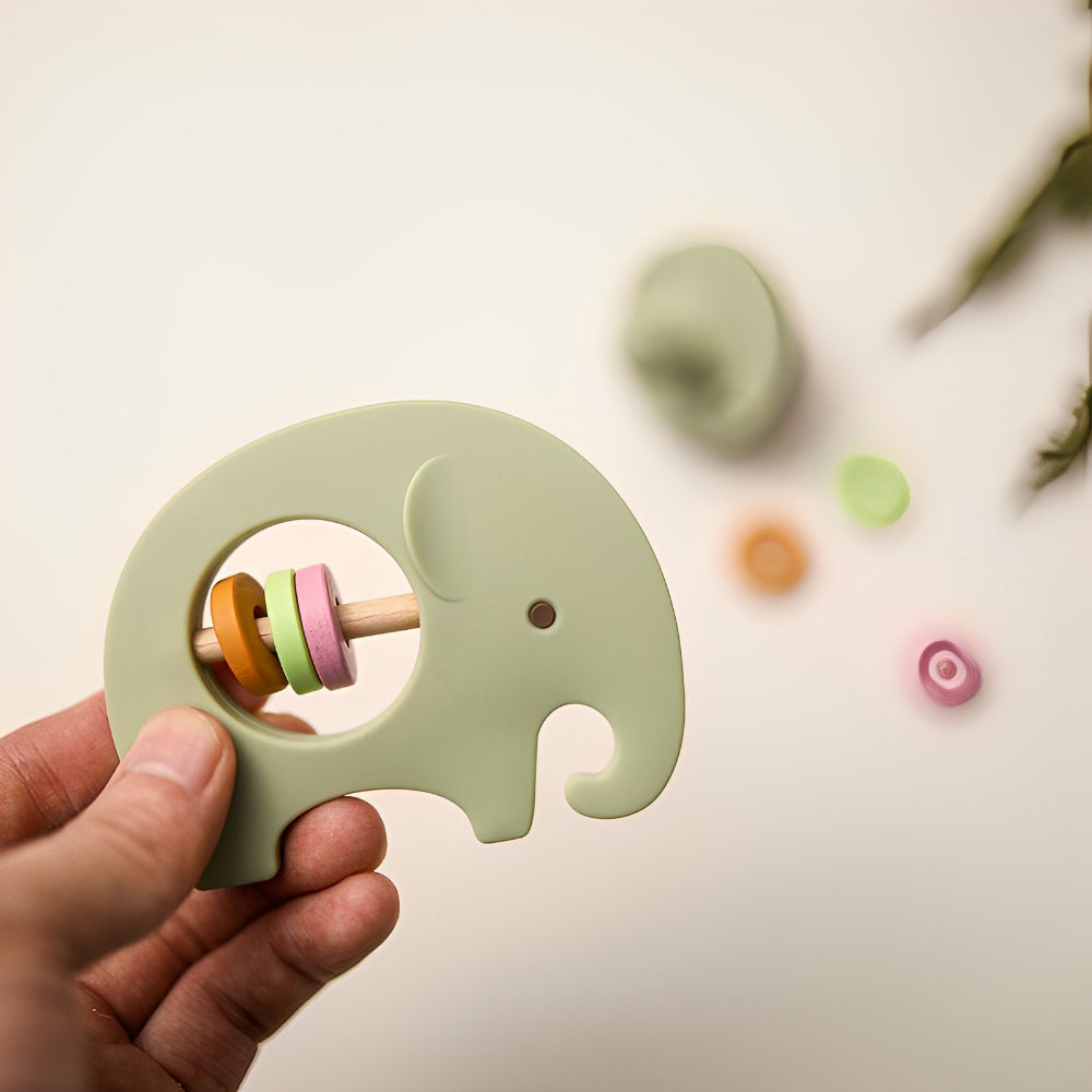 Jucărie dentiție și zornăitoare bebeluși,Micul elefant, Verde, 3 luni+